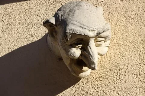 Face on a wall Stock Photos