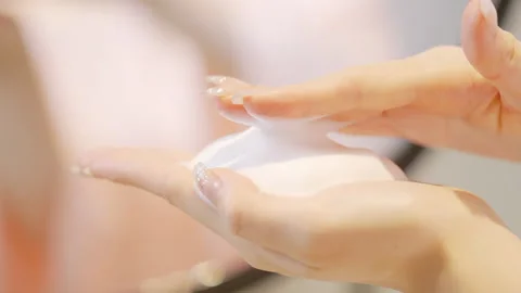 Face wash exfoliation scrub soap in woman girl hand with thick soapy lather 動画素材 333359002