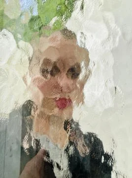 Face in wavy pattern glass window with blurred and distorted face concept for me Stock Photos