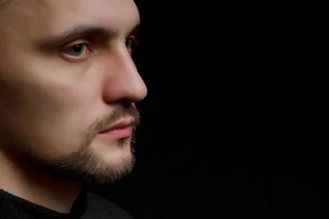 Face of a young man Stock Photos