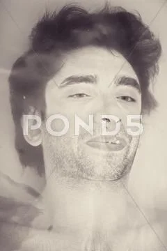 Face of the young men in the muddy water Stock Photos