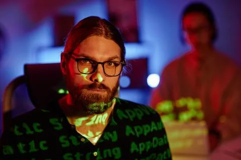 Face of young serious diversity programmer in eyeglasses Foto stock