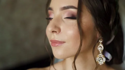 Face young woman looking at camera serious attractive beautiful hair slow motion Stock Footage 234086096