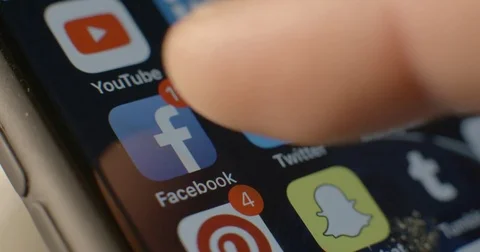 Facebook app on Iphone 8 macro slow motion Stock Footage 84633752