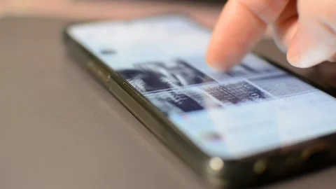 Facebook app scroll on iphone screen device. facebook by meta social network. Video stock 302344495