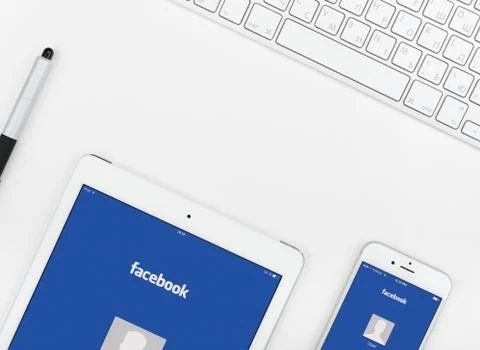 Facebook application  on the iPhone and iPad display Stock Photos