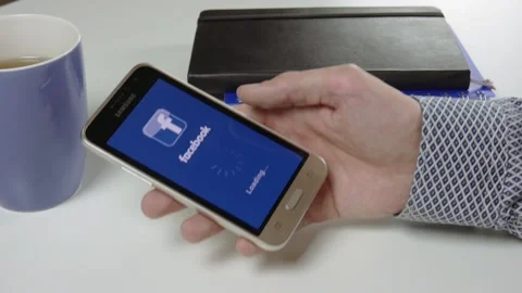 The Facebook application is loaded for a very long time Stock Footage 99834134