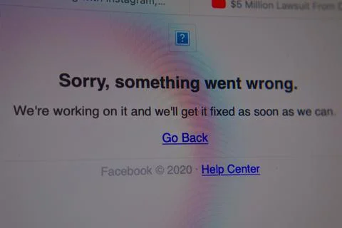 Facebook error message on screen from outage front view Stock Photos