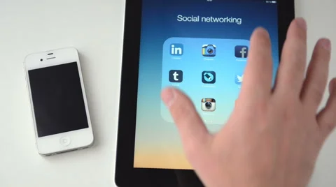 Facebook on an iPad display Stock Footage 43212661