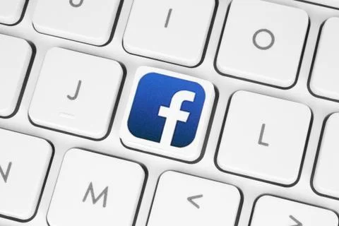 Facebook logo placed on computer keyboard Stock Photos
