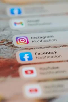 Facebook notification  on smartphone Stock Photos