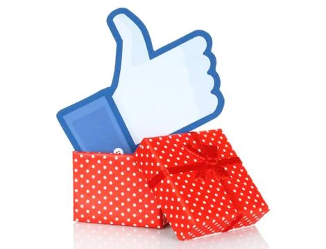 Facebook thumbs up sign printed on paper and put into present box Stock Photos