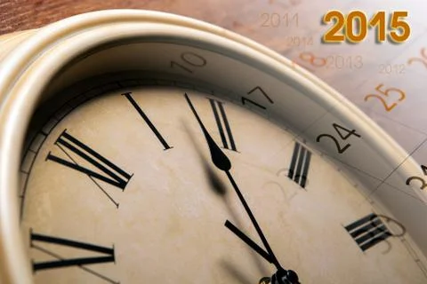 Faceclock and sheet of a calendar with the number of days Stock-Fotos