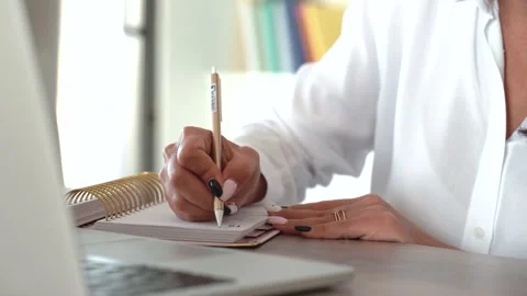 Faceless close up view of female doctors hands handwriting Stock Footage 169021136