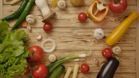 Faceless cook putting smartphone on table with vegetables Stock Footage 119686420