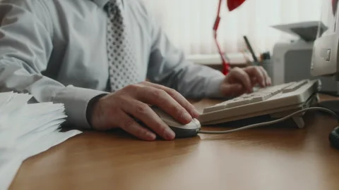 Faceless Employee Using Old Wired Mouse while Working on Computer in Office Stock Footage 280260106