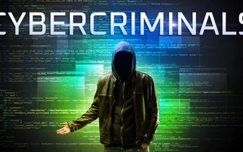 Faceless hacker on code background 写真素材