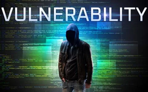 Faceless hacker on code background Stock Photos