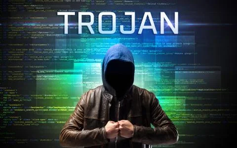 Faceless hacker on code background Foto stock