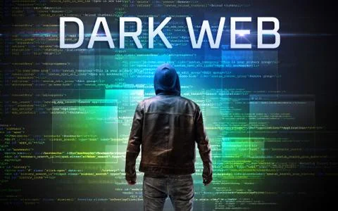 Faceless hacker on code background Stock Photos