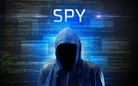 Faceless hacker on code background Stock Photos