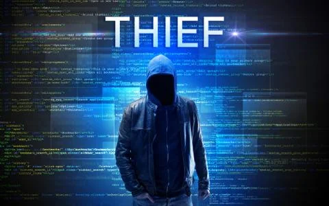 Faceless hacker on code background Stock Photos