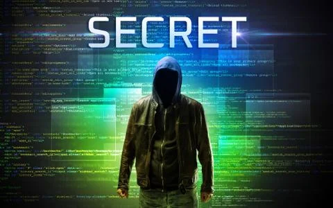 Faceless hacker on code background 写真素材