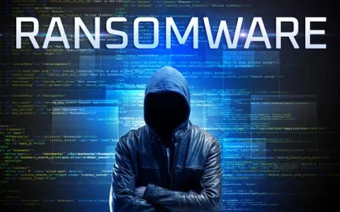 Faceless hacker on code background Foto stock