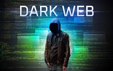 Faceless hacker on code background Stock Photos
