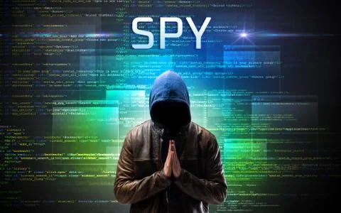 Faceless hacker on code background Stock Photos