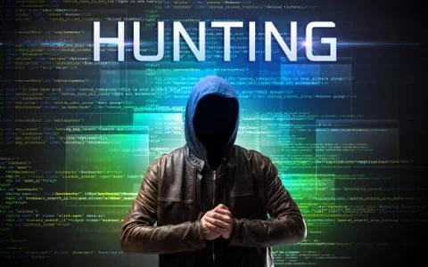 Faceless hacker on code background Stock Photos