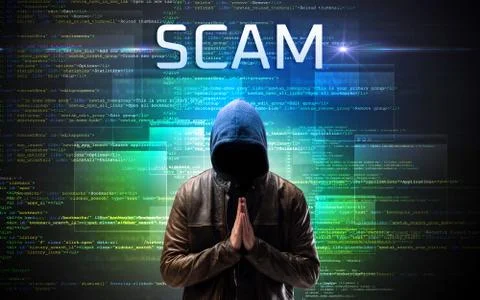 Faceless hacker on code background Stock Photos
