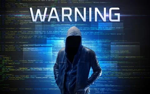 Faceless hacker on code background Foto stock