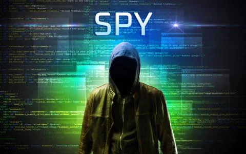 Faceless hacker on code background Foto stock