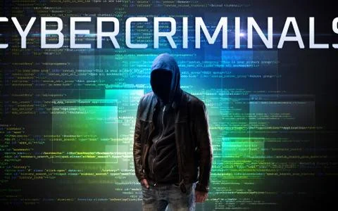 Faceless hacker on code background Foto stock