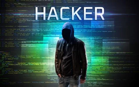 Faceless hacker on code background Stock Photos