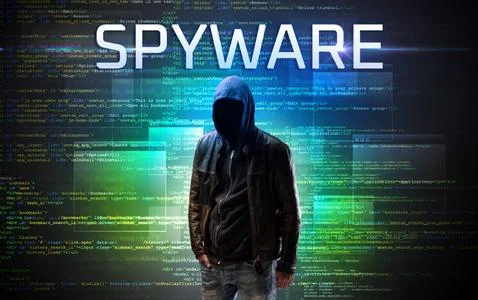 Faceless hacker on code background Foto stock