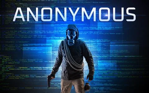 Faceless hacker on code background Foto stock