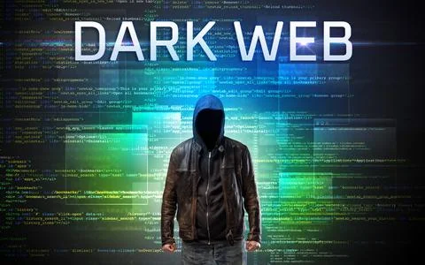 Faceless hacker on code background Foto stock