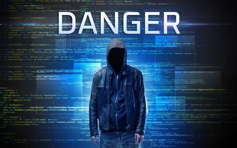 Faceless hacker on code background Stock Photos