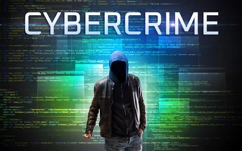 Faceless hacker on code background Foto stock