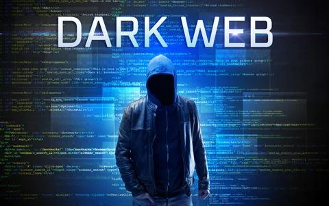 Faceless hacker on code background Foto stock