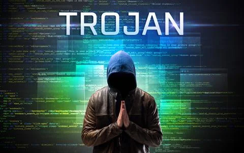 Faceless hacker on code background Foto stock