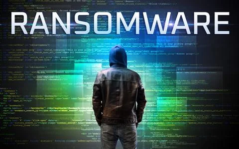 Faceless hacker on code background Stock Photos