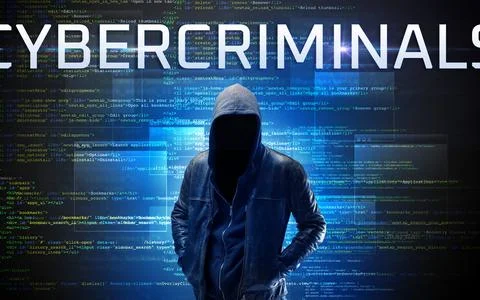 Faceless hacker on code background Stock Photos