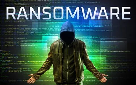 Faceless hacker on code background Stock Photos