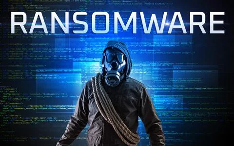 Faceless hacker on code background Stock Photos