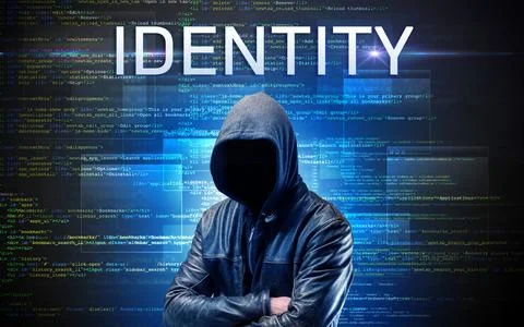 Faceless hacker on code background Stock Photos