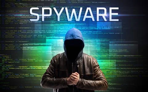 Faceless hacker on code background Stock Photos
