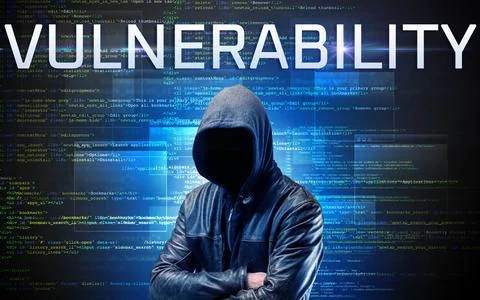 Faceless hacker on code background Foto stock